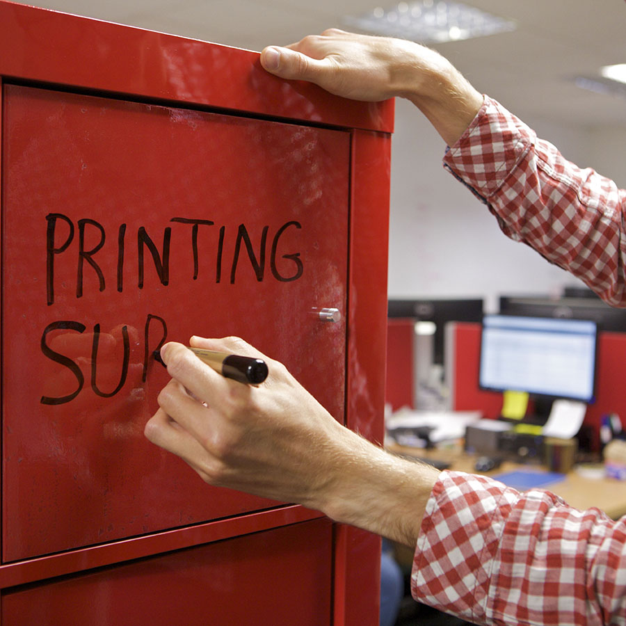 Clear dry erase film applied on cabinet writable surface